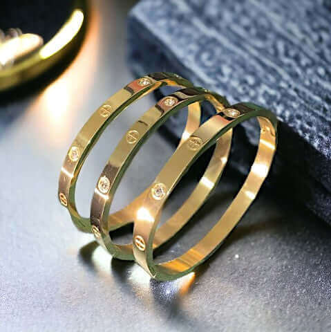 Radiant Gold Stainless Steel Cuff Bracelet with Zirconia Stones