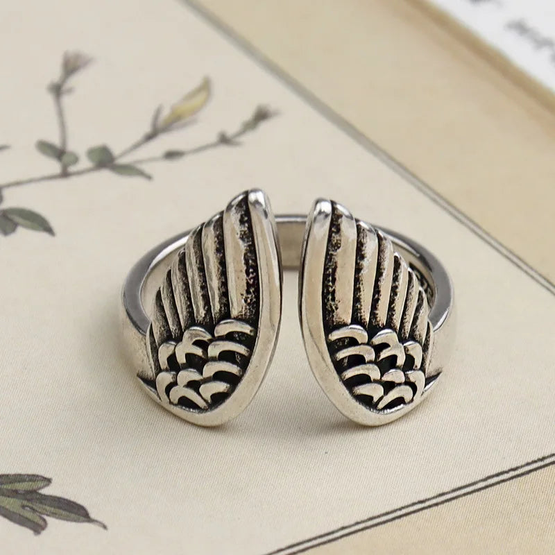 925 sterling silver angel wing ring textured feather design